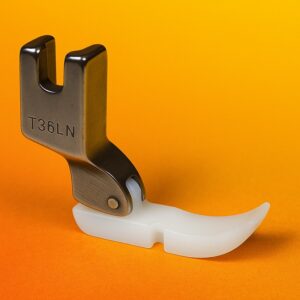 stopka do wszywania zamków, wąska, z teflonową płozą, lewa t 36ln